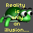 Pixelated green turtle with large eyes and a shell, positioned against a gray background with yellow text reading "Reality is only an illusion... caused by the lack of lots and lots of ALCOHOL!!!!!".