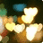 Animated icon with glowing hearts and changing text overlays reading LOVE, is a..., and BITCH <3.