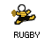 Pixelated character in black and yellow striped outfit holding golden object, leaping against gray background with 'RUGBY' text below.