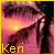 A close-up of a person's face with dark hair and pinkish skin tones, featuring the text 'Keri' in yellow at the bottom left.