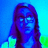 Pixelated image of a person with long hair and glasses on left, green text 'haha i look smart!' on blue background right.