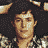 Pixelated image of two people in plaid shirts and khaki pants with "Coolbuddy.com" text on a black background, arranged as a 3x2 contact sheet frame from an animated icon sequence.