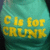 Static buddy icon with yellow text on a teal gradient background, pixelated appearance typical of early internet graphics.