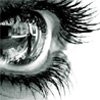 Black-and-white close-up of a stylized eye with long, curved eyelashes and a swirling iris pattern containing faint, unreadable text elements.