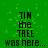 Green background with pixelated text reading "TIM the TREE was here..." in black, arranged in a pattern across multiple repeated sections