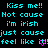 Pixelated cyan text on black background reads 'Kiss me!! Not cause I'm irish just cause feel like' with pink heart symbols replacing 'i' in 'like' and 'me!!' in the second instance.