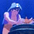 Pixelated image of a person in blue hat and white shirt with text overlays across four