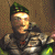 A pixelated character in green beret and armor with shifting facial expressions