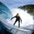 Pixelated static image of a person in a wetsuit surfing on a wave with rocky coastline and blue sky background.