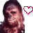 A pixelated image of a person with long brown hair and dark clothing, flanked by two identical side-by-side views separated by a red heart symbol.