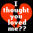 A pixelated red broken heart with white text reading "I thought you loved me??" on a black background.