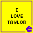 Yellow square with purple border containing black text "I LOVE TAYLOR" and a small purple Pac-Man-like icon in the bottom-right corner.