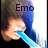 A person with dark hair holds a blue object near their mouth, wearing black clothing against a bright background.