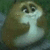 A cartoon character with brown fur and a white underbelly sits with arms crossed, eyes shifting from left to right