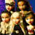 Pixelated of doll-like figures with blonde hair and blue eyes, overlaid text reading 'PROSTI bots', alternating purple and blue background stripes