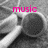 A grayscale image of a microphone with pink text reading 'music is life' appearing sequentially across four