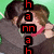 Two people embrace against a green background with red text overlays changing across frames.