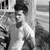 A black-and-white animated sequence shows a person in motion against an outdoor background with vertical structures.