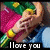 Pixelated image of a person in pink and blue clothing holding a colorful object with text "I love you" at the bottom.
