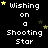 Black background with white pixelated text reading "Wishing on a Shooting Star" and scattered yellow and brown star icons.