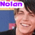 Pixelated image of a person with dark hair smiling, overlaid with purple text labels in different positions.