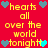 Red background with yellow text reading 'hearts all over the world tonight' and alternating blue/teal heart icons.