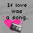 Pixelated text reads "If love was a song.." and "you would be the lyrics!" above two pink hearts with camera icons, on gray background.