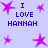 Pixelated purple background with blue text 'I LOVE HANNAH' and pink star shapes in various sizes and positions.