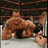 Four distinct images of a muscular man in various poses and settings, including wrestling ring action and formal attire. The top-left shows him pinning another person on a mat; the top-right has him standing with hands on hips; bottom-left is a close-up against dark ; bottom-right features him shirtless against blue background