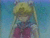 Animated sequence of anime characters with changing poses and background elements, featuring a blonde character with twin buns and a dark-haired character in traditional attire.