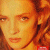 A pixelated image of a person with light brown hair and fair skin, next to green text reading 'Original Icons .com' on a dark background.