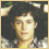 A pixelated split- image shows a person with dark hair on the left and 'PROUD AAA MEMBER' text in beige block letters on a dark background on the right