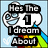 Pixelated icon with text 'Has The 1 I dream About' over a light blue background, featuring a magnifying glass and colorful shapes.