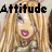 Pixelated four- shows a blonde woman with pink lips and green clothing; text reads "Attitude Is Everything"