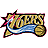 Pixelated graphic with stylized text, blue and white accents, pink burst effects, and a basketball icon on the right side.