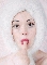 Pixelated static image of a person with light skin, dark eyebrows, and red lips holding a finger near their mouth against a white background.