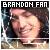Pixelated image with text "BRANDON FAN" at top, featuring a person's face in warm tones against dark background.