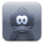 Pixelated character with large white eyes and dark pupils, wearing a dark hooded garment against a gradient gray background.