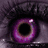 A split-screen image with a close-up of an eye on the left and pixelated text on a purple background on the right.