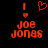 Red pixelated text and symbols on black background: vertical bar, heart outline, small heart, 'Joe' stacked above 'Jongs'.