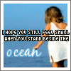 A pixelated image of a woman in a white dress standing by the ocean with overlaid text.
