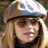A 48x48 pixel buddy icon featuring a blonde woman in a light blue cap on the left and green text reading "Original Icons .com" on a dark green background on the right, displayed as part of an animated contact sheet with two frames.