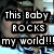 A static image shows two people with overlaid text reading "This Baby ROCKS my world!!!" in bold white letters on black rectangular backgrounds.