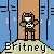 Pixel art character with brown hair and pink accessories stands in a doorway between blue panels, wearing gray armor with yellow accents over black shorts on a beige ground.