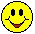 Yellow circular icon with black eyes and red mouth showing a smiling face, transitioning through multiple spiral rotation frames before returning to the original smile.
