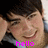 A pixelated image of a person with dark hair smiling, wearing a light blue shirt, with pink text reading 'hello' at the bottom left and 'beautiful' at the bottom right.