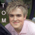 A person with light brown hair wearing a pink collared shirt appears in four , the rightmost is blank