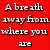 A static image with red and blue sections displaying pixelated text reading 'A breath away from where you are' on top and 'I've come home from so far.' below.