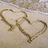 Two interlocked heart shapes drawn in light brown on a beige textured background, with orange text overlays reading "i l.o.v.e Jesse Wence" and "forever and always babe".