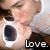 A person with brown hair and light skin holds a white cup, mouth open in an 'O' shape; the word "Love." appears below.